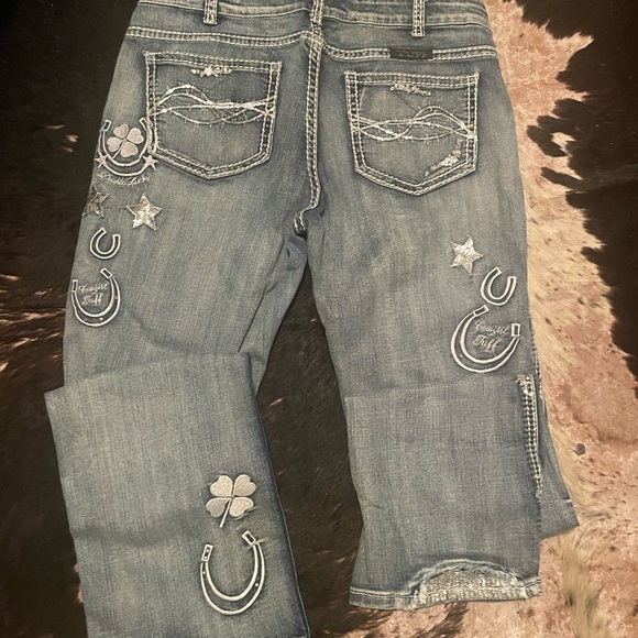 Blue Jeans with Decorative Embellishments and Contrast Stitching - Picture 3 of 10